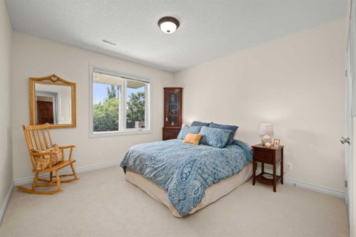 51 Elysian Crescent Sw, Calgary, AB - Indoor Photo Showing Bedroom