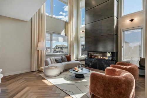 147 Siltstone Place, Balzac, AB - Indoor Photo Showing Living Room With Fireplace