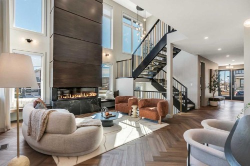 147 Siltstone Place, Balzac, AB - Indoor Photo Showing Living Room With Fireplace