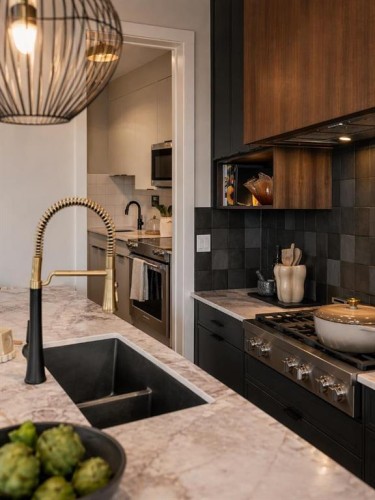 147 Siltstone Place, Balzac, AB - Indoor Photo Showing Kitchen With Double Sink