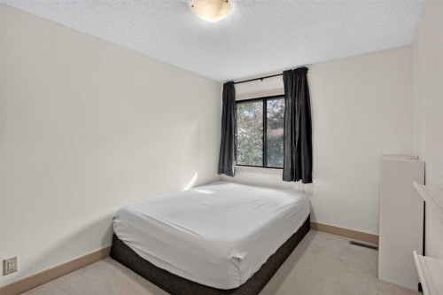 571 Point Mckay Grove Nw, Calgary, AB - Indoor Photo Showing Bedroom