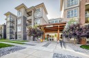 1210-95 Burma Star Road Sw, Calgary, AB  - Outdoor With Balcony With Facade 