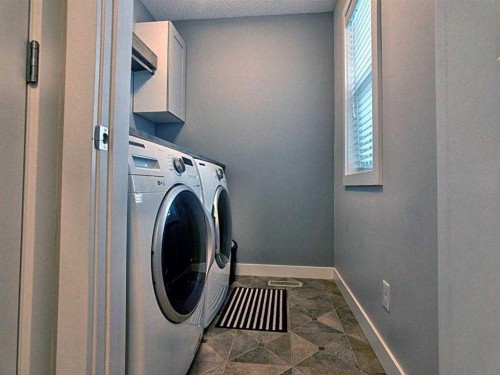 251 Hillcrest Circle Sw, Airdrie, AB - Indoor Photo Showing Laundry Room