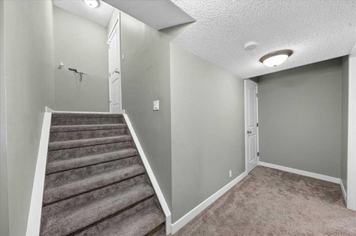 251 Hillcrest Circle Sw, Airdrie, AB - Indoor Photo Showing Other Room