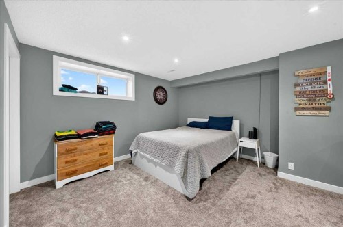 251 Hillcrest Circle Sw, Airdrie, AB - Indoor Photo Showing Bedroom