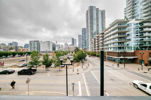 218-615 6 Avenue Se, Calgary, AB - Outdoor With Balcony With Facade