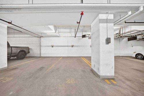 218-615 6 Avenue Se, Calgary, AB - Indoor Photo Showing Garage