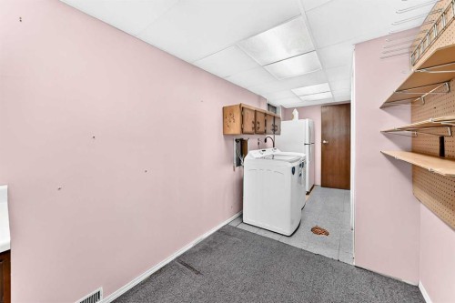 13-336 Rundlehill Drive Ne, Calgary, AB - Indoor Photo Showing Laundry Room