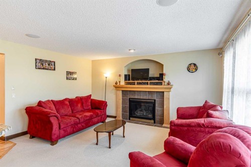 23 Royal Oak Terrace Nw, Calgary, AB - Indoor Photo Showing Living Room With Fireplace