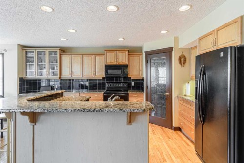 23 Royal Oak Terrace Nw, Calgary, AB - Indoor Photo Showing Kitchen With Upgraded Kitchen