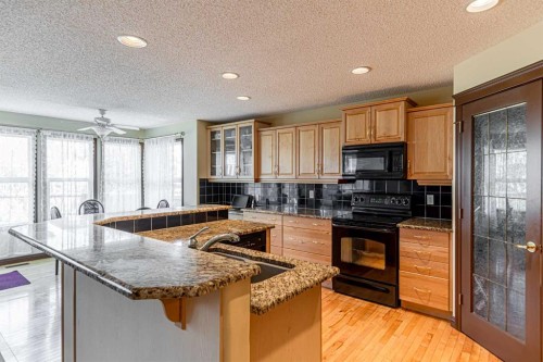 23 Royal Oak Terrace Nw, Calgary, AB - Indoor Photo Showing Kitchen With Double Sink