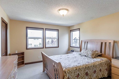 23 Royal Oak Terrace Nw, Calgary, AB - Indoor Photo Showing Bedroom