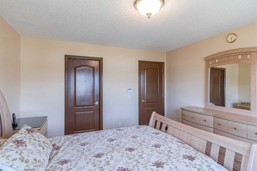 23 Royal Oak Terrace Nw, Calgary, AB - Indoor Photo Showing Bedroom