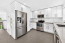 1803-1530 Bayside Avenue, Airdrie, AB  - Indoor Photo Showing Kitchen With Double Sink 