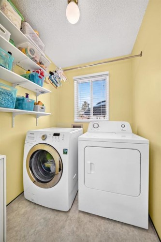 91 Templehill Drive Ne, Calgary, AB - Indoor Photo Showing Laundry Room