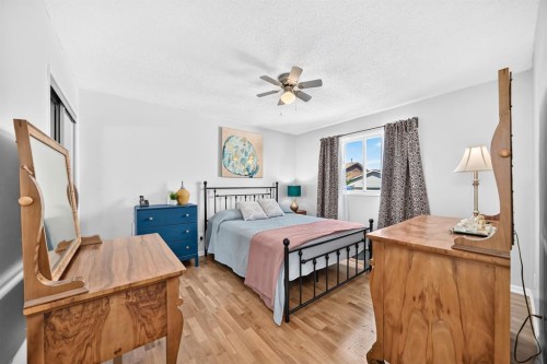 91 Templehill Drive Ne, Calgary, AB - Indoor Photo Showing Bedroom