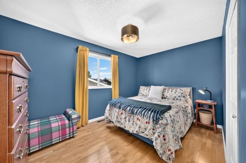 91 Templehill Drive Ne, Calgary, AB - Indoor Photo Showing Bedroom