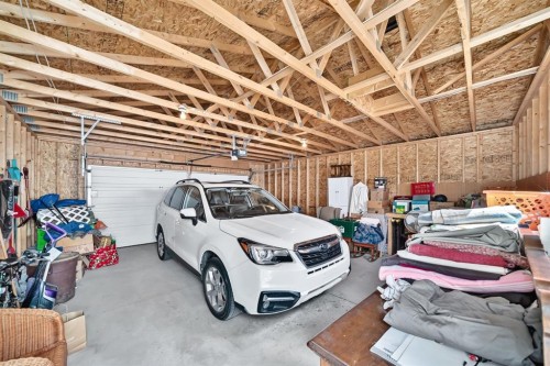 91 Templehill Drive Ne, Calgary, AB - Indoor Photo Showing Garage