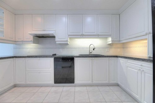 8 Prominence Path Sw, Calgary, AB - Indoor Photo Showing Kitchen