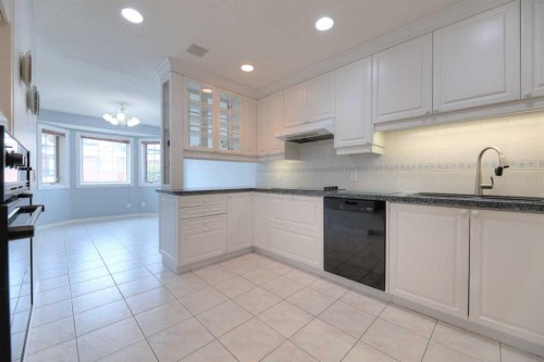8 Prominence Path Sw, Calgary, AB - Indoor Photo Showing Kitchen
