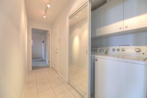 8 Prominence Path Sw, Calgary, AB - Indoor Photo Showing Laundry Room