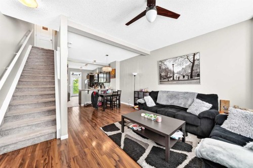 60 New Brighton Point Se, Calgary, AB - Indoor Photo Showing Living Room