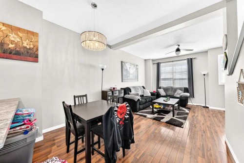 60 New Brighton Point Se, Calgary, AB - Indoor Photo Showing Dining Room