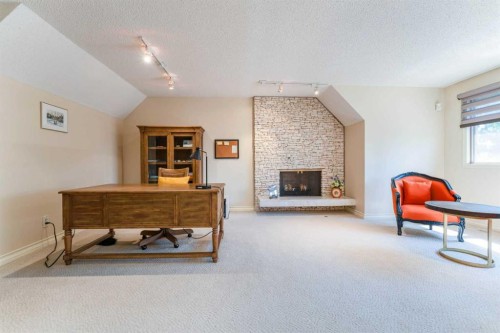 240 Canterville Drive Sw, Calgary, AB - Indoor With Fireplace