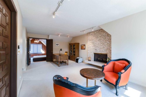 240 Canterville Drive Sw, Calgary, AB - Indoor With Fireplace