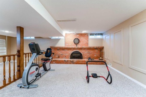 240 Canterville Drive Sw, Calgary, AB - Indoor Photo Showing Gym Room