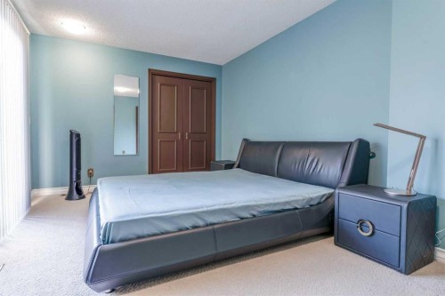 240 Canterville Drive Sw, Calgary, AB - Indoor Photo Showing Bedroom
