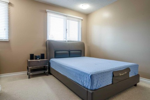 240 Canterville Drive Sw, Calgary, AB - Indoor Photo Showing Bedroom