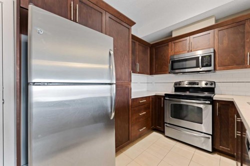 205-20 Royal Oak Plaza Nw, Calgary, AB - Indoor Photo Showing Kitchen With Stainless Steel Kitchen
