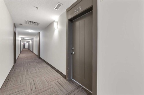 205-20 Royal Oak Plaza Nw, Calgary, AB - Indoor Photo Showing Other Room