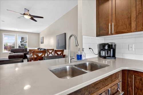2003-280 Williamstown Close Nw, Airdrie, AB - Indoor Photo Showing Kitchen With Double Sink
