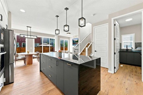 945 Chinook Winds Sw, Airdrie, AB - Indoor Photo Showing Kitchen With Upgraded Kitchen