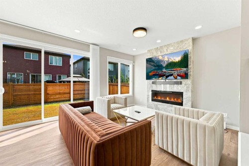 945 Chinook Winds Sw, Airdrie, AB - Indoor With Fireplace