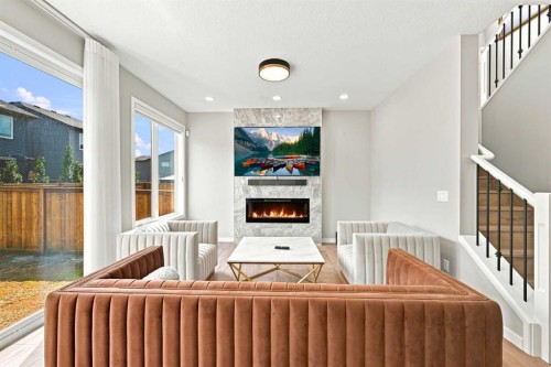 945 Chinook Winds Sw, Airdrie, AB - Indoor With Fireplace