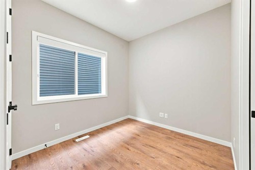 945 Chinook Winds Sw, Airdrie, AB - Indoor Photo Showing Other Room