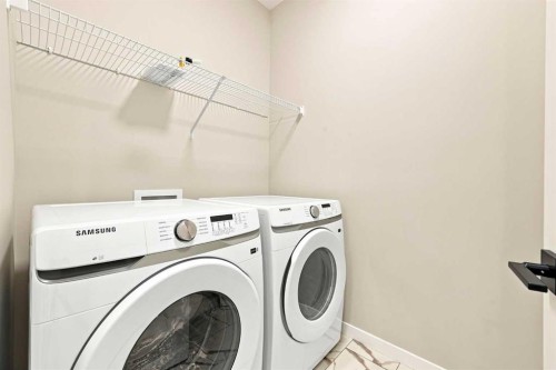 945 Chinook Winds Sw, Airdrie, AB - Indoor Photo Showing Laundry Room