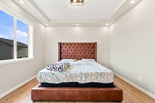 945 Chinook Winds Sw, Airdrie, AB - Indoor Photo Showing Bedroom