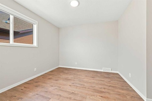 945 Chinook Winds Sw, Airdrie, AB - Indoor Photo Showing Other Room