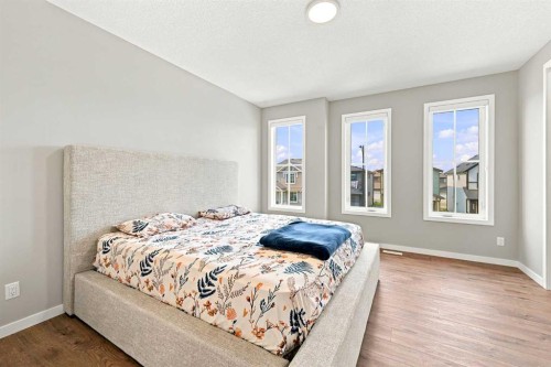 945 Chinook Winds Sw, Airdrie, AB - Indoor Photo Showing Bedroom