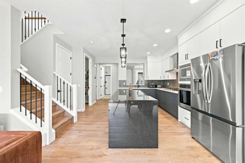945 Chinook Winds Sw, Airdrie, AB - Indoor Photo Showing Kitchen With Upgraded Kitchen