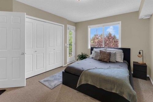 411-140 Sagewood Boulevard Sw, Airdrie, AB - Indoor Photo Showing Bedroom
