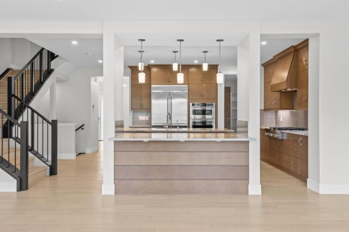 192 Magnolia Manor Se, Calgary, AB - Indoor Photo Showing Kitchen With Upgraded Kitchen