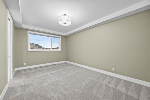 192 Magnolia Manor Se, Calgary, AB - Indoor Photo Showing Other Room