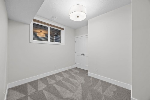 192 Magnolia Manor Se, Calgary, AB - Indoor Photo Showing Other Room