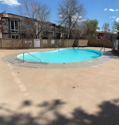 108-816 89 Avenue Sw, Calgary, AB - Outdoor With In Ground Pool