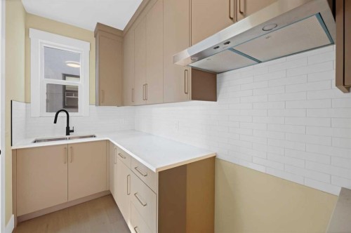 506 Waterford Rise, Chestermere, AB - Indoor Photo Showing Kitchen With Double Sink